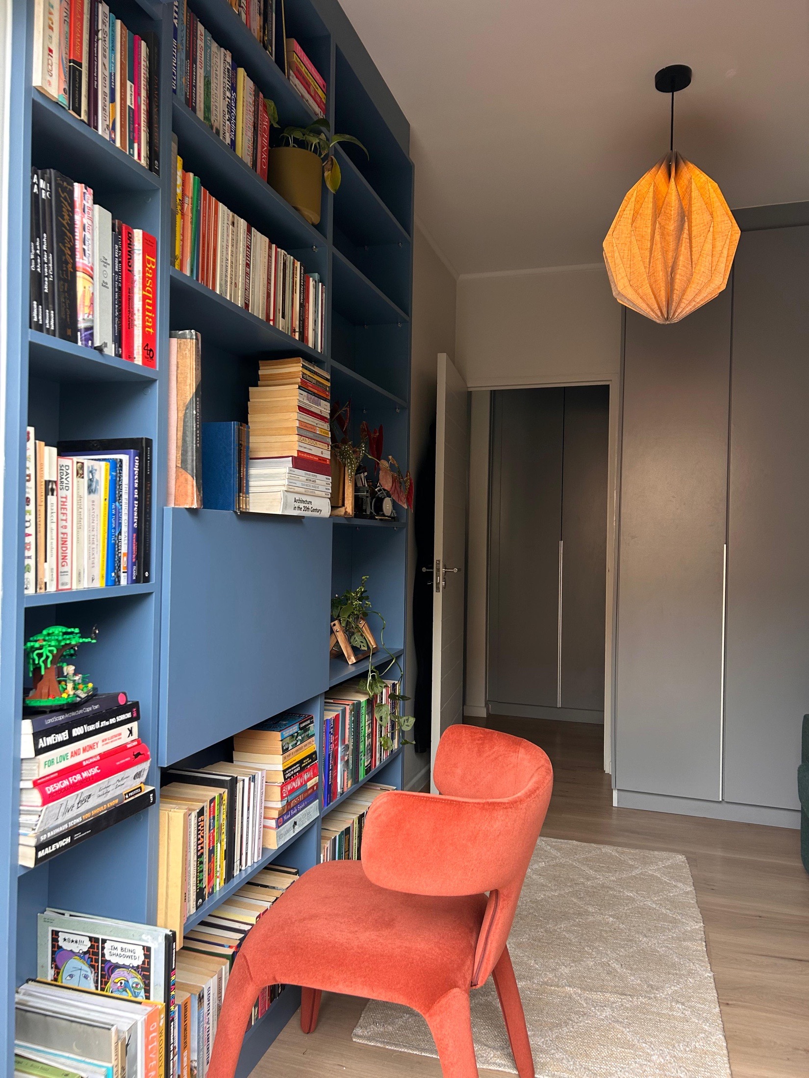 Navy floor-to-ceiling built-in library
