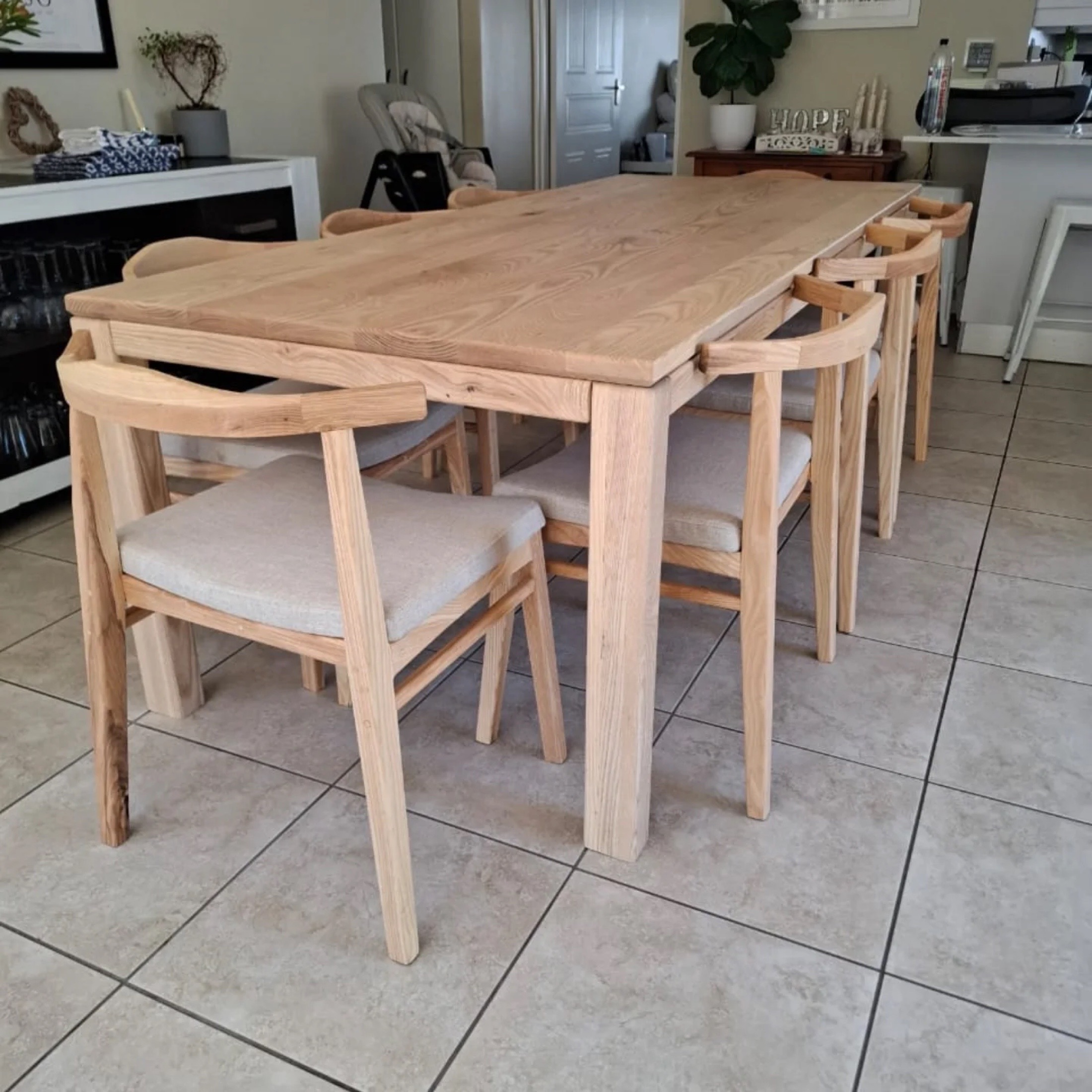 Raw ash dining table with matching chairs