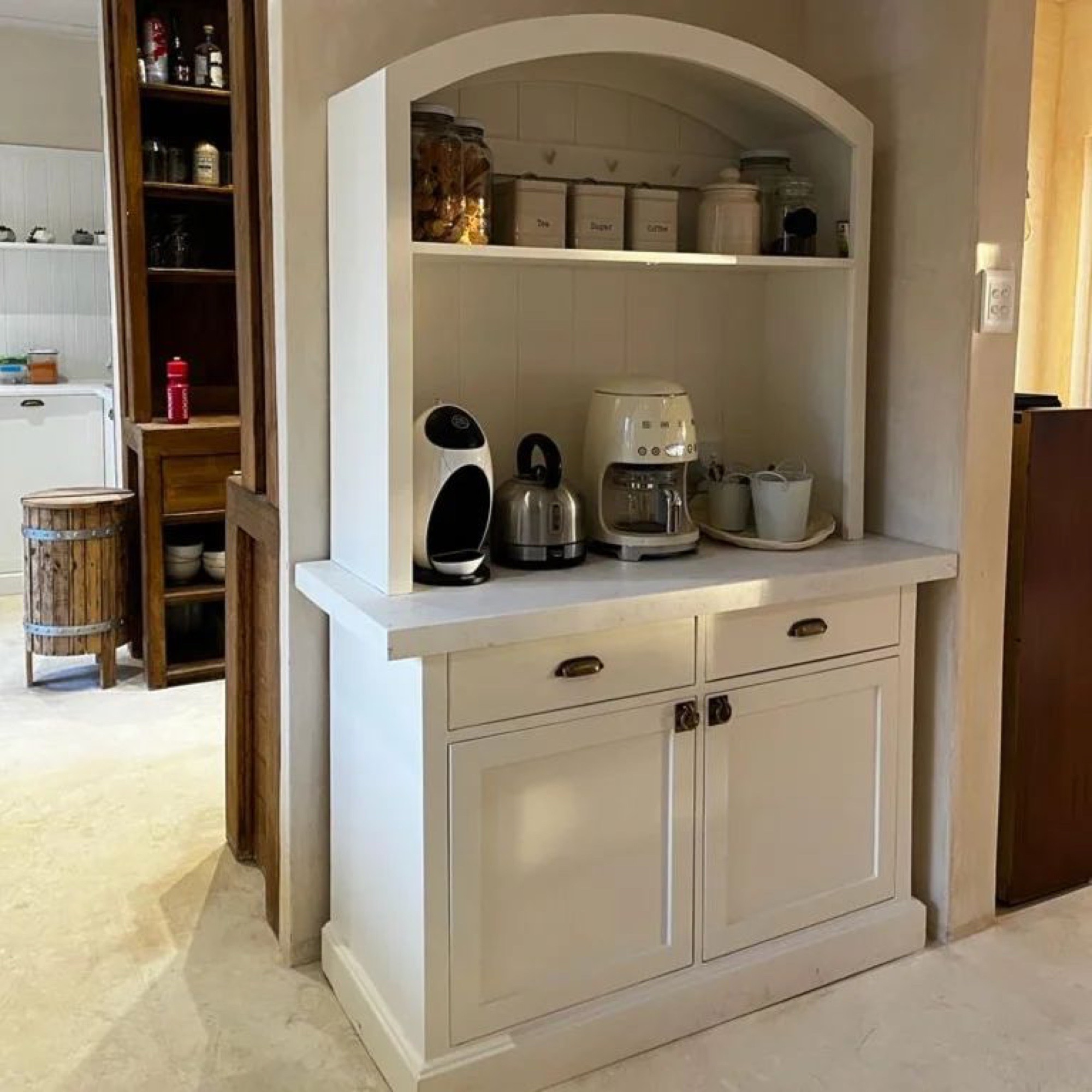 Bespoke built-in pantry and scullery with arched niche
